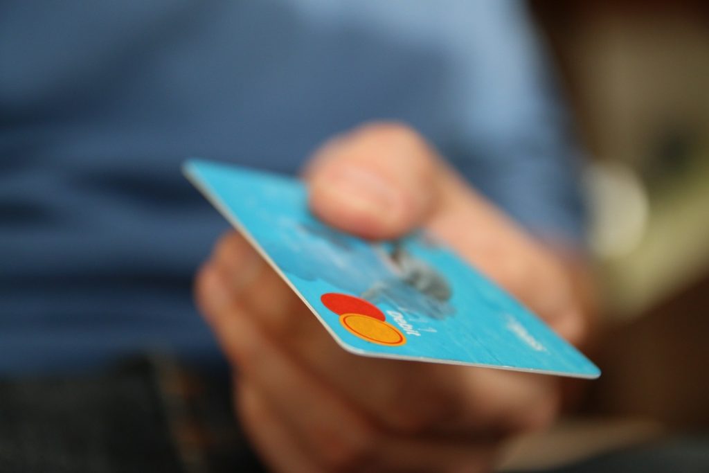 human-hand-holding-credit-card